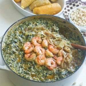 Enjoying nutritious and delicious ndole (spinach and shrimp) for Black History Month