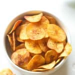 Baked Plantain Chips fresh from the oven in a bowl ready to enjoy with your favorite salsa