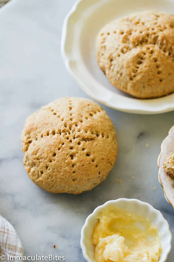 Coconut bakes with butter on a white plate