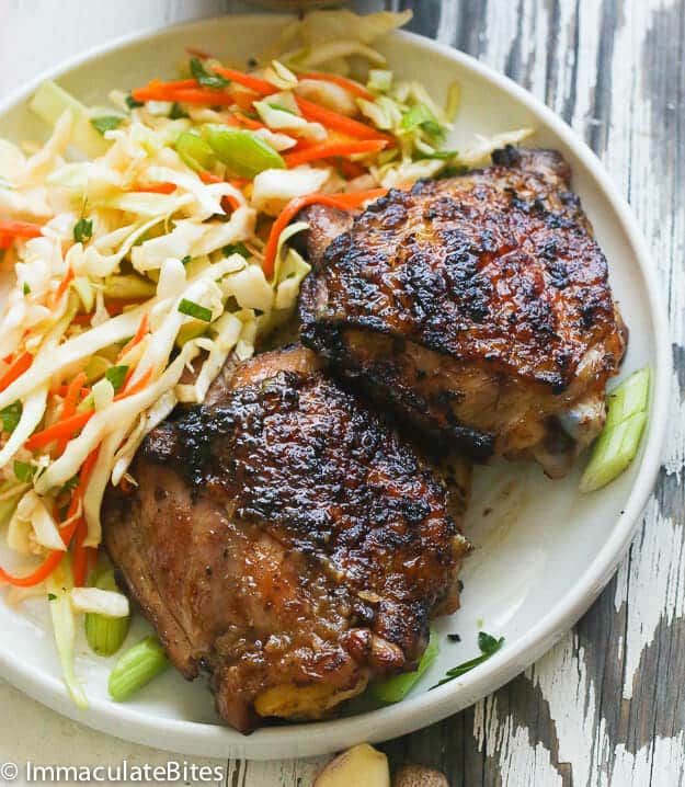 Caribbean Coleslaw Served with Two Jerk Chicken Thighs