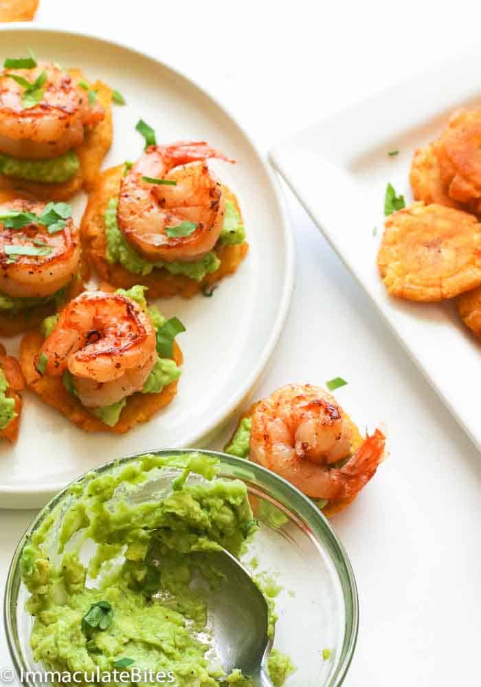 Tostones Topped with Guacamole and Seasoned Shrimp