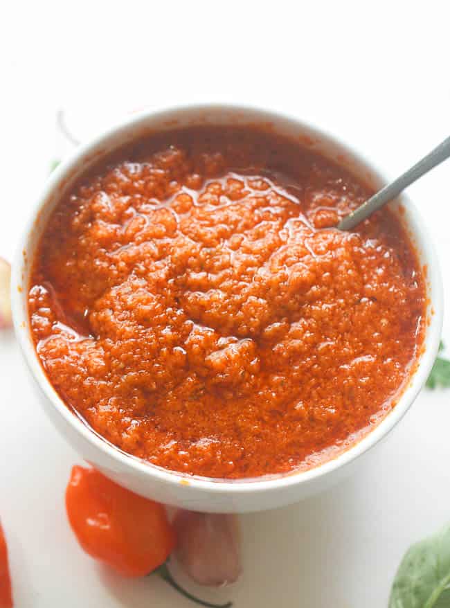 Serving up freshly pureed African pepper sauce