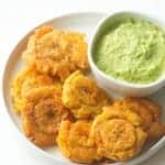 Tostones with green mayo for the perfect snack.
