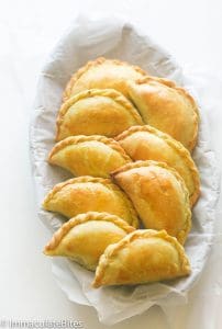 Jamaican beef patties ready to serve in a basket