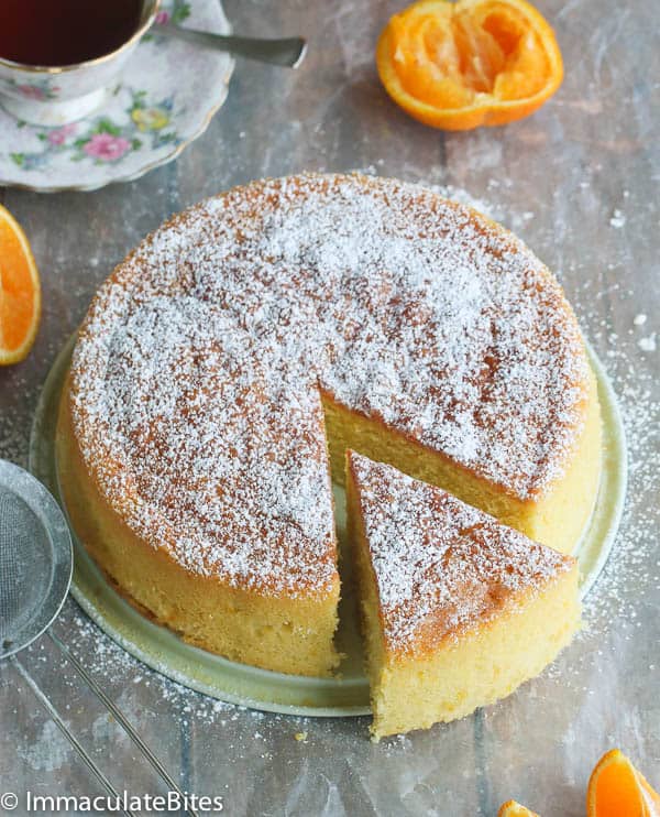 Orange Cake Dusted with Powdered Sugar Served with Tea