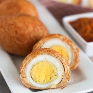 Slicing into an African Egg Roll or Nigerian scotch egg