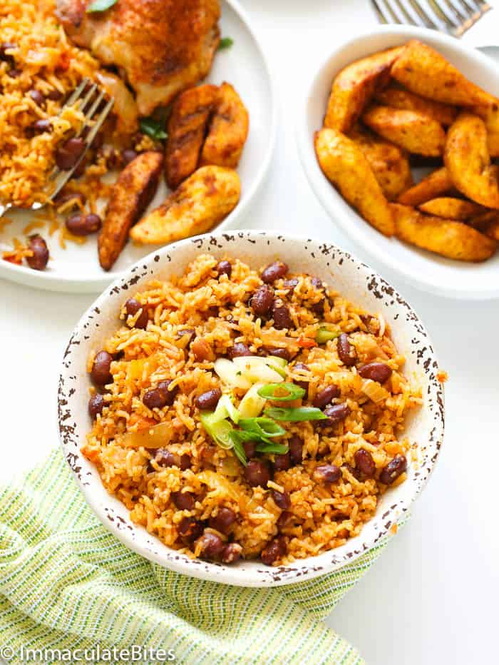 Fried rice with beans served with plantains