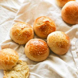 Slicing into buttery Brioche Buns for pure comfort