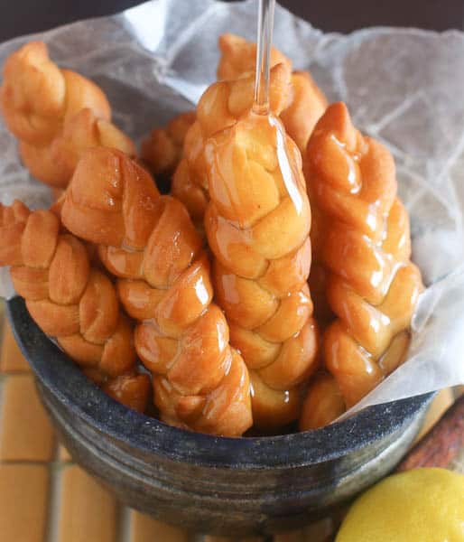 traditional koeksisters drizzled with syrup