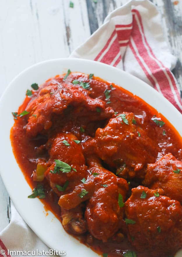 Ridiculously delicious African Chicken Stew ready to be served over Coconut rice