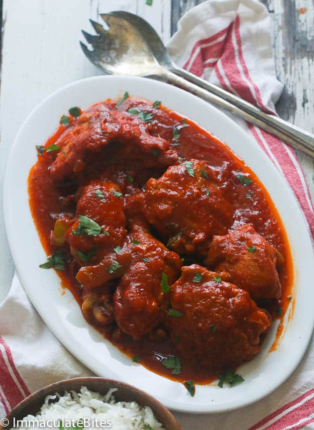 Mouthwatering African Chicken Stew ready to serve with coconut rice