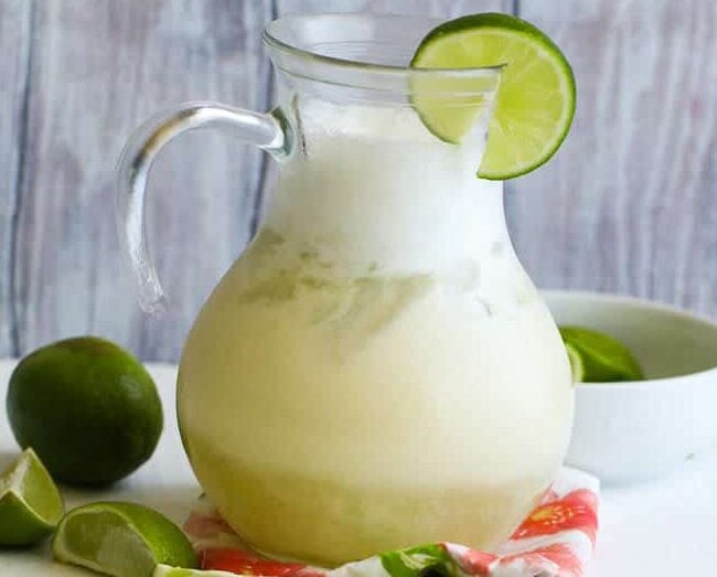 Brazilian lemonade with condensed milk and limes for a refreshing tropical drink