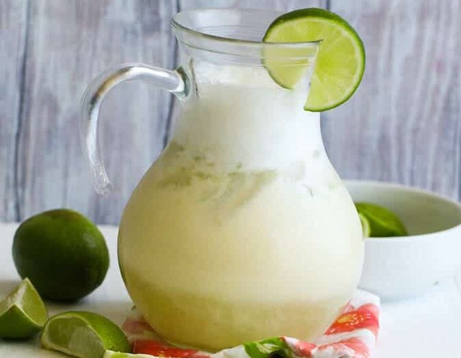 Brazilian lemonade with condensed milk and limes for a refreshing tropical drink