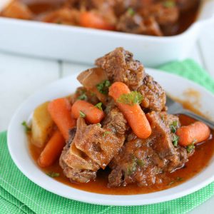Enjoying a hearty bowl of Caribbean oxtail stew