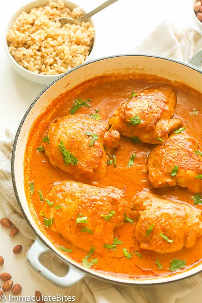 Peanut stew and chicken in a pot.