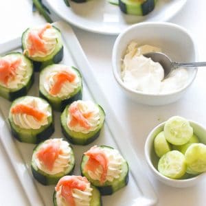 Assembling Cucumber, Salmon, Cream Cheese Appetizers for a healthy appetizer