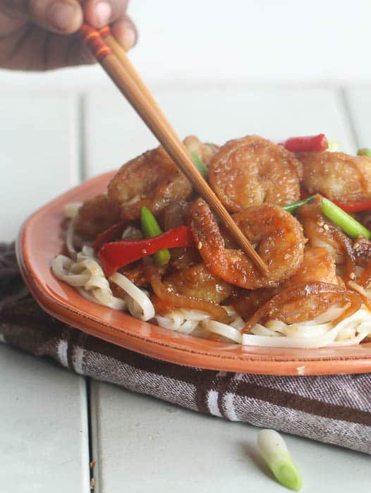 Enjoying fabulous Mongolian shrimp over noodles