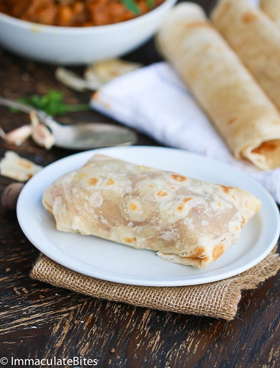 Trinidadian chicken roti rolled up like a burrito