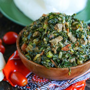 Serving up a delectable bowl of sukuma wiki (African collard greens) with ugali or fufu