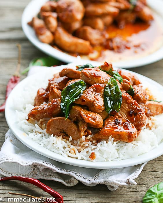 Spicy Thai Chicken Basil served over steamed rice, a home-style Asian dish