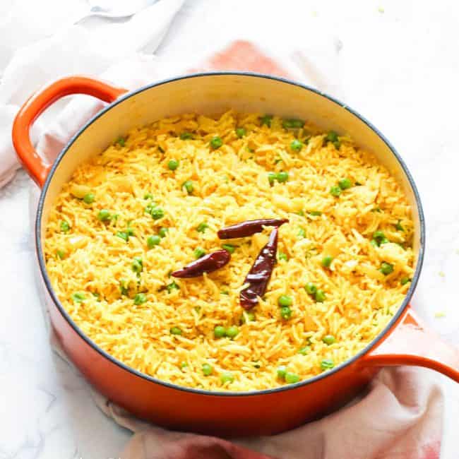 Yellow Rice with cayenne in a red pot