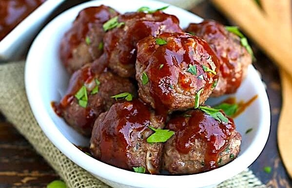 A bowl of pineapple glazed meatballs ready to enjoy