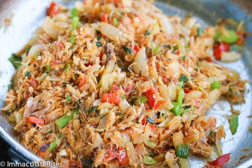 Step 5: Throw in salt fish in sauteed vegies