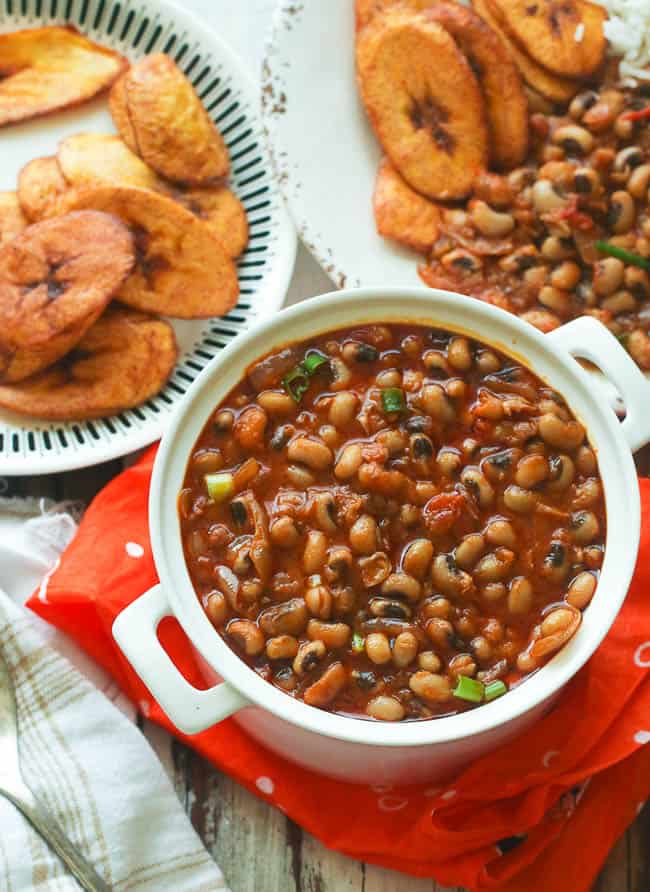 African stewed black-eyed beans served with plantain chips