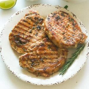 Rosemary Pork Chops with mango salsa and a squeeze of lime for a deliciously easy weeknight dinner