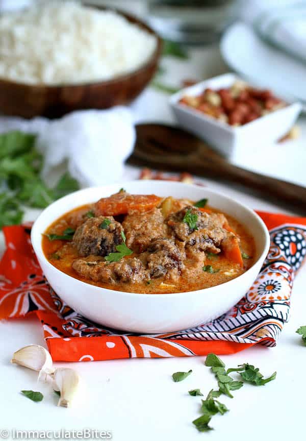 An amazing bowl of maafe (West African peanut soup) ready to enjoy over steaming hot rice