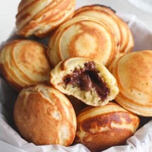 A basket full of delightfully light Aebleskiver Danish Pancakes