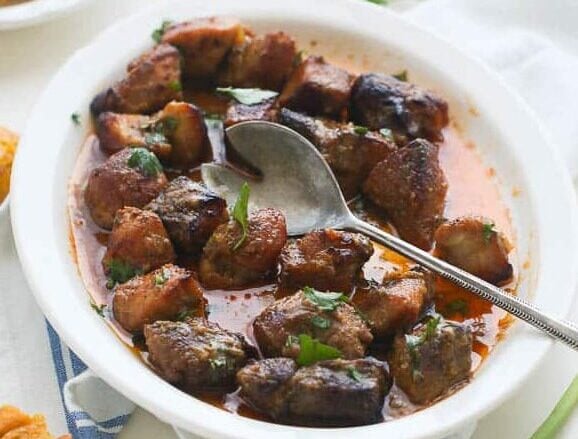 Pork Griot in a serving bowl ready to enjoy