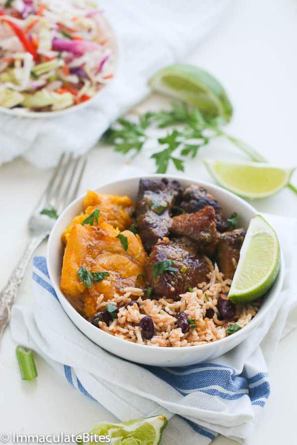 Pork Griot with rice and bean with other vegetables