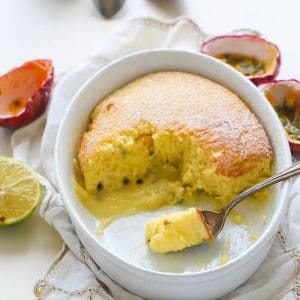 A white casserole with passion fruit pudding cake