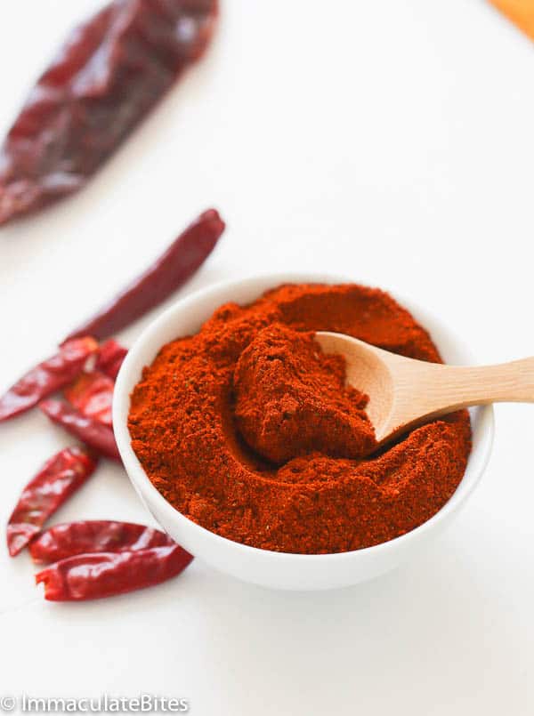 Scooping into freshly made berbere spice mix