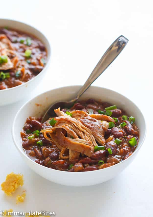 A bowl of chicken and bean stew cooked in a slow cooker 