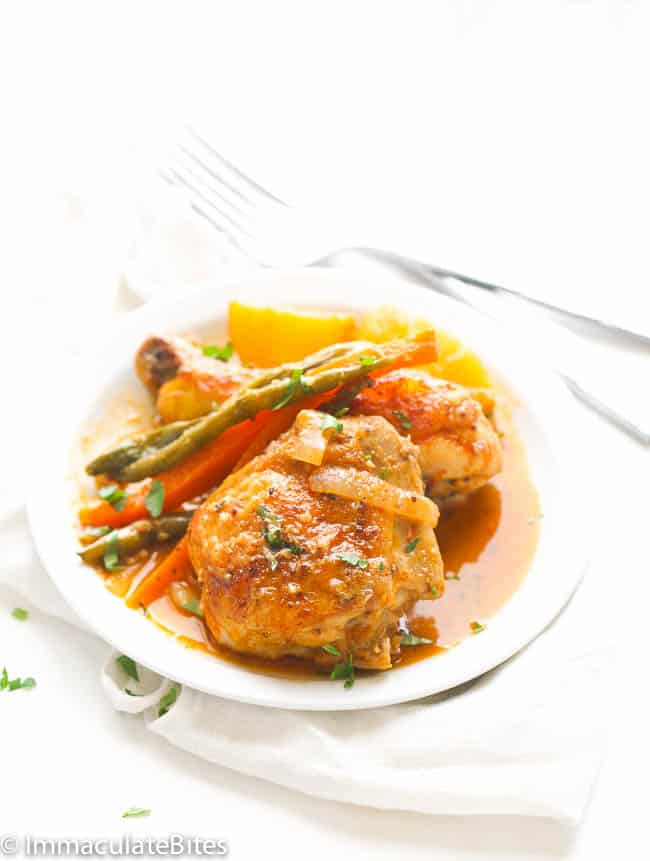 A plate loaded with delicious braised chicken for a healthy New Year's recipe
