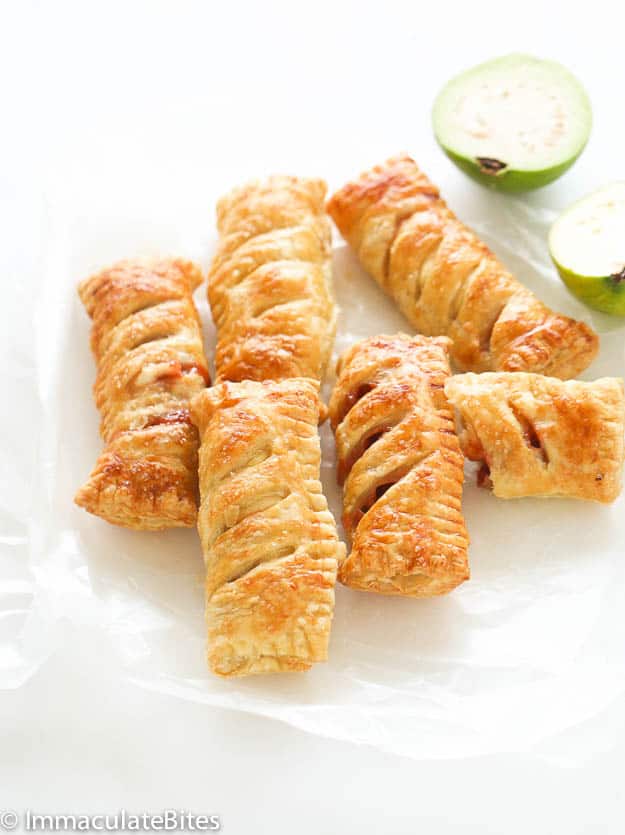 Five and a Half Pieces of Guava Pastries with Sliced Guava in the Background