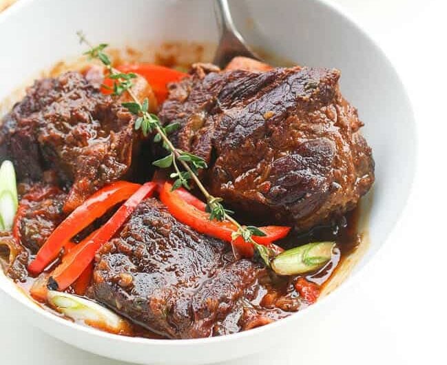 Jamaican Brown Beef Short Ribs Stew ready to enjoy with polenta on the side