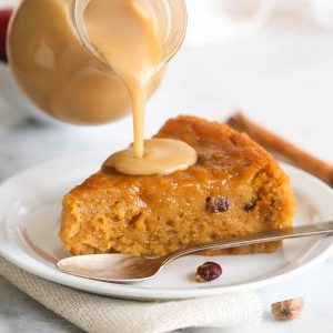 Drizzling a rich syrup over Corn Pone for a decadent treat