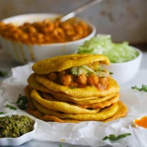 A stack of flatbread and curry chickpeas for Trinidad's doubles