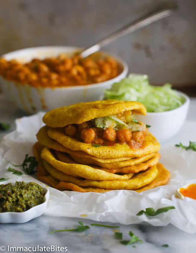 A stack of flatbread and curry chickpeas for Trinidad's doubles