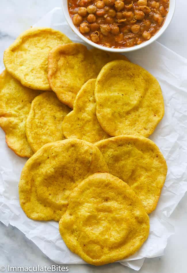 Yellow baras with curry chickpeas for doubles