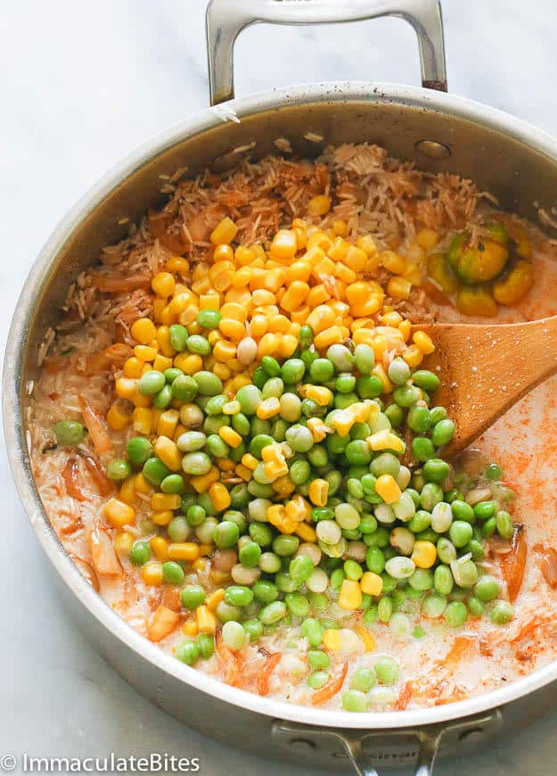 Peas and Corn Tossed in a Pan with Uncooked Rice Mixture