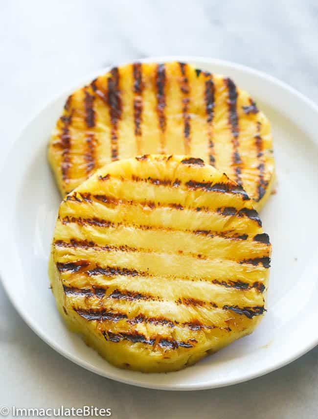 two slices of grilled pineapple