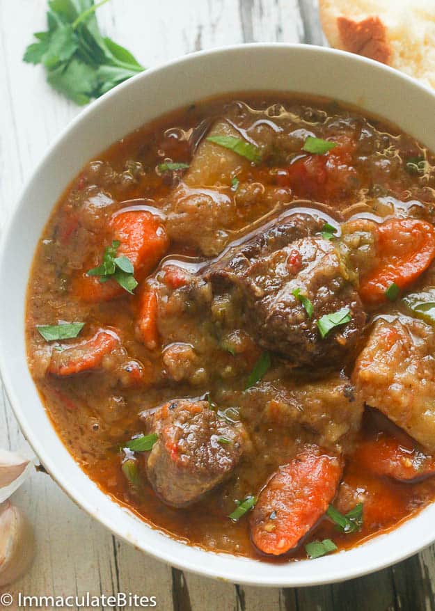 A bowl of Jamaican beef stew loaded with veggies