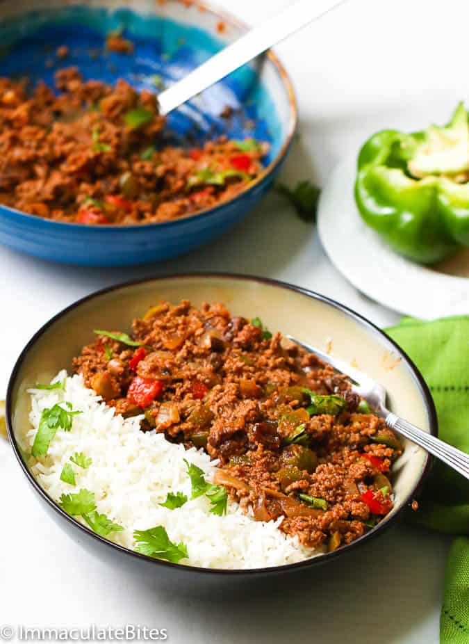 Puerto Rican picadillo with rice and garnished with cilantro