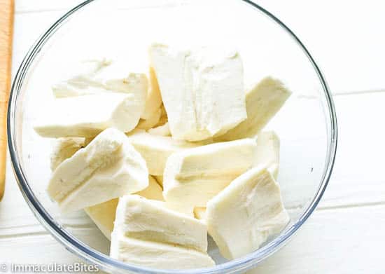 Chop the yuca and remove the taproot fiber