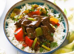 Tasty, savory pepper steak over rice for a quick and easy weeknight dinner