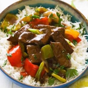 Tasty, savory pepper steak over rice for a quick and easy weeknight dinner